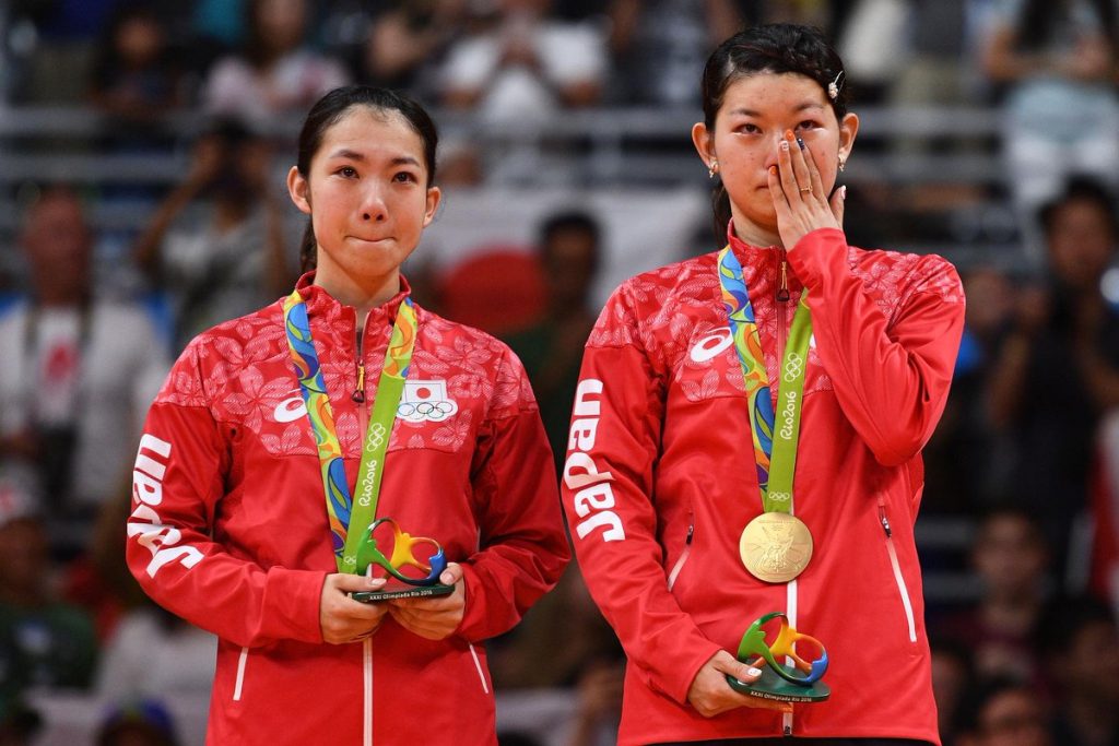 Ayaka Takahashi and Misaki Matsutomo with their Olympic gold