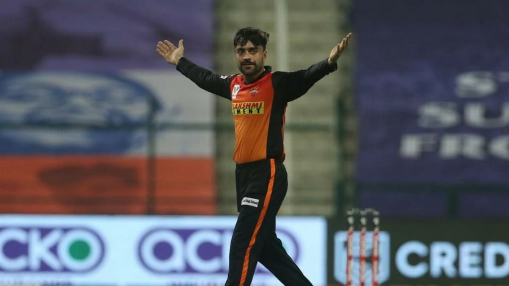 Rashid Khan celebrates a wicket against DC