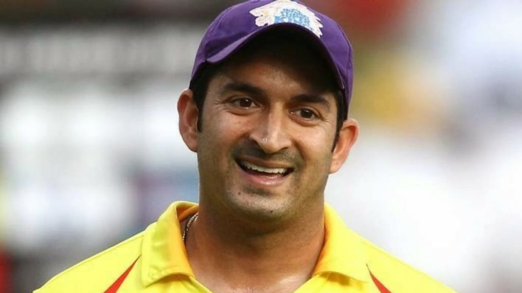 Mohit Sharma with Purple Cap