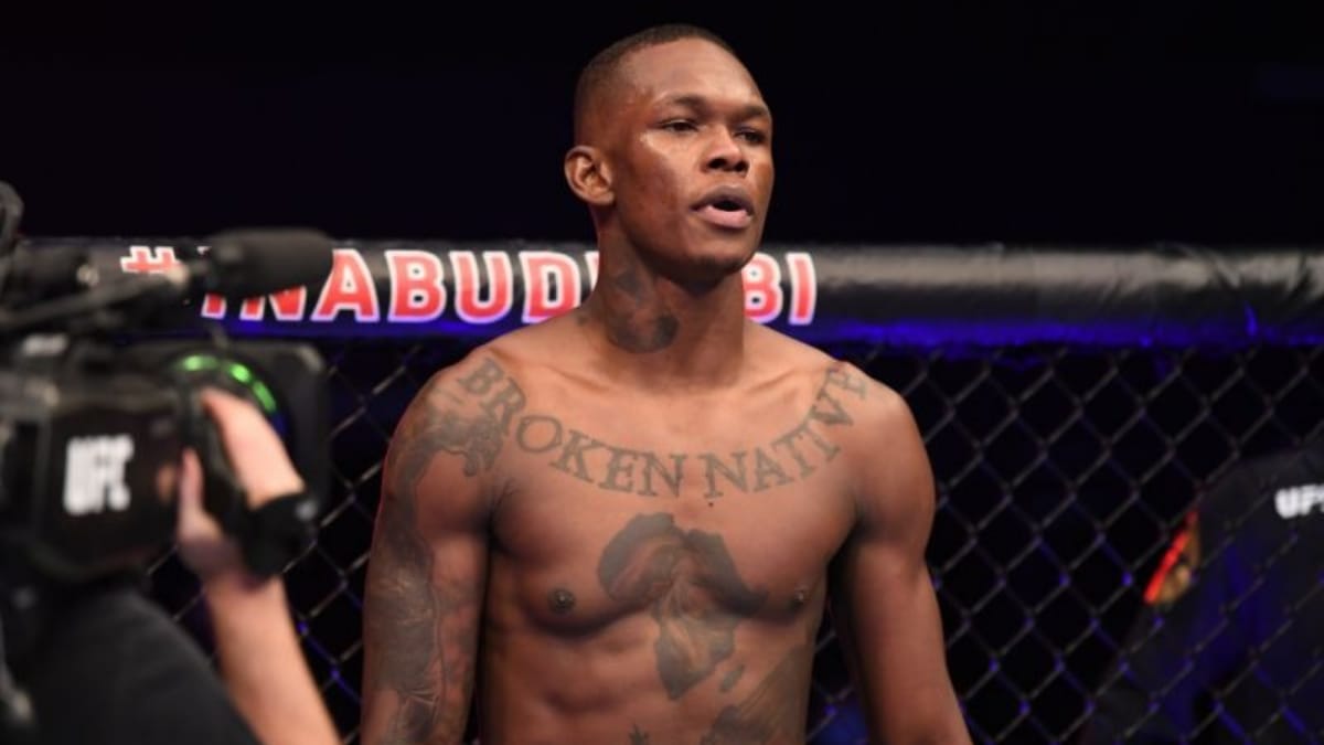 Israel Adesanya blames it on weed for his saggy right pec; but says he won’t stop smoking weed