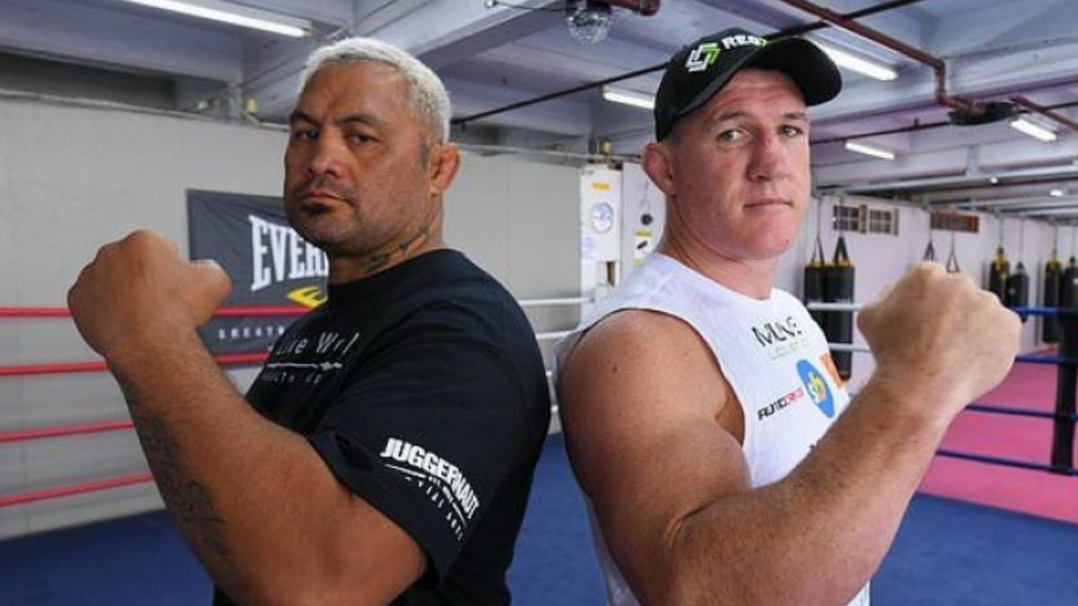 Ahead of his boxing bout against Paul Gallen, former UFC star Mark Hunt swings wildly at Gallen during the weigh-ins