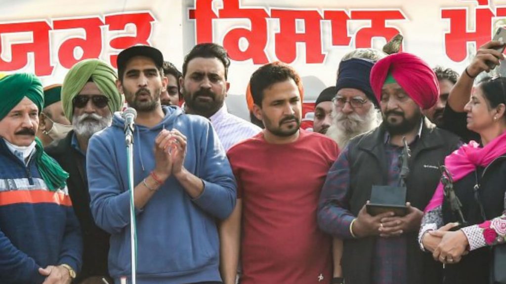 Vijender Singh protesting with farmers