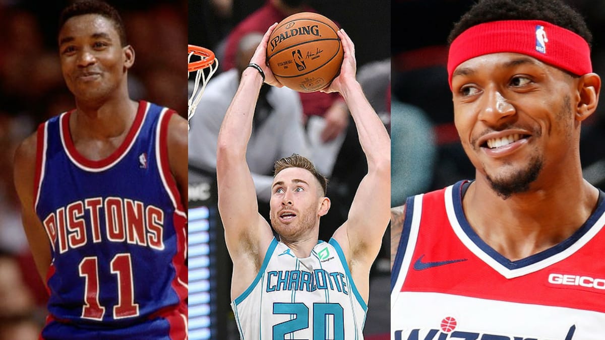 Bradley Beal and Isiah Thomas stand for Gordon Hayward