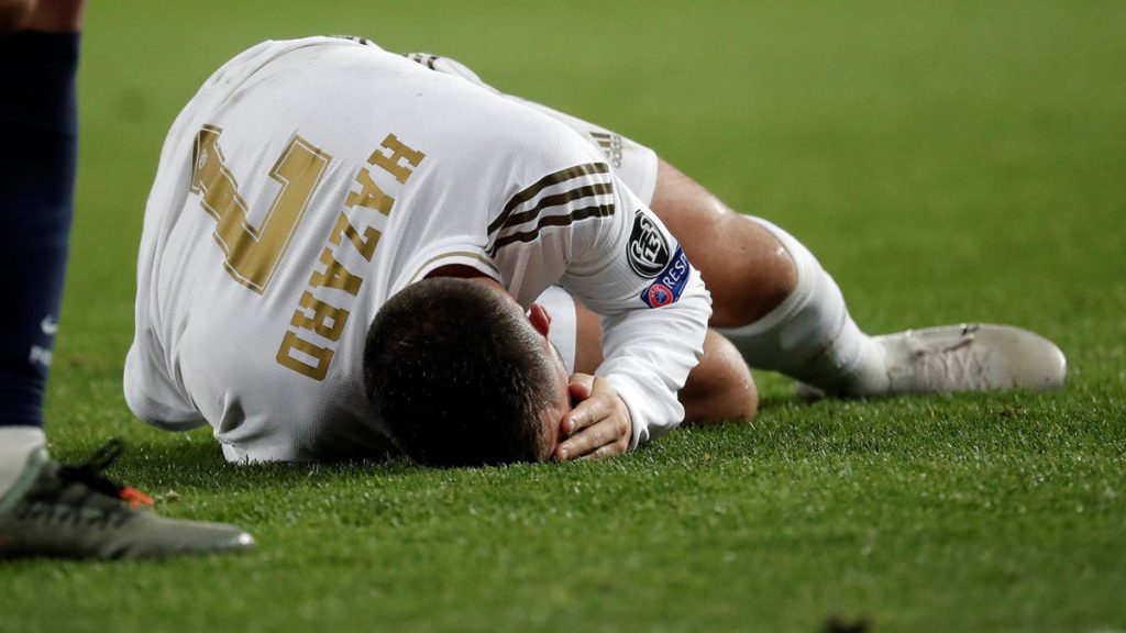 Eden Hazard of Real Madrid gets injured during the UEFA Champions League Group 