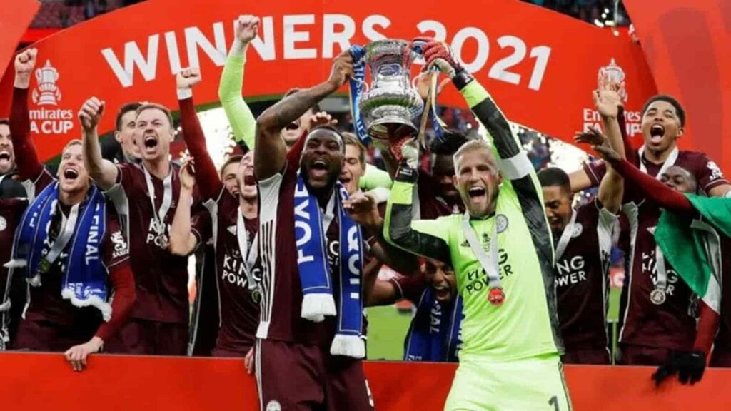 Wes Morgan and Kasper Schmeichel with the FA Cup trophy