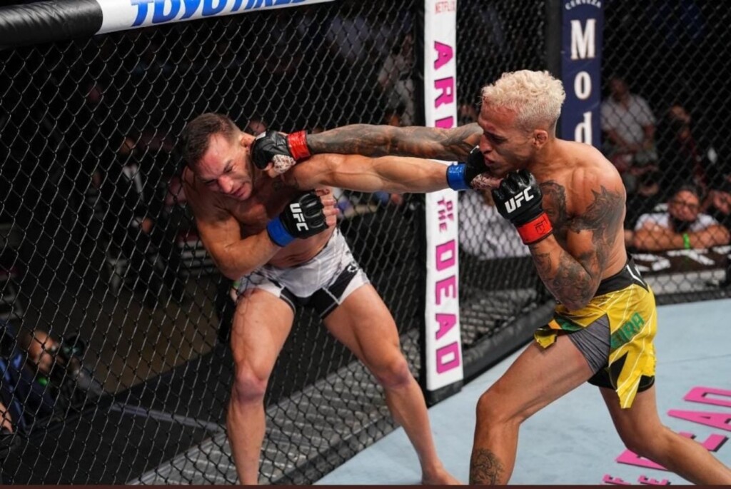 Charles Oliveira knocking Chandler out