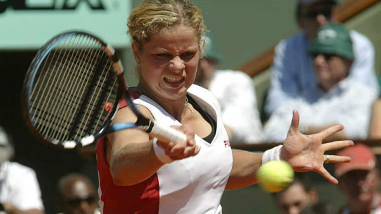 Kim Clijsters experiencing different kind of clay and grass on the baseball field