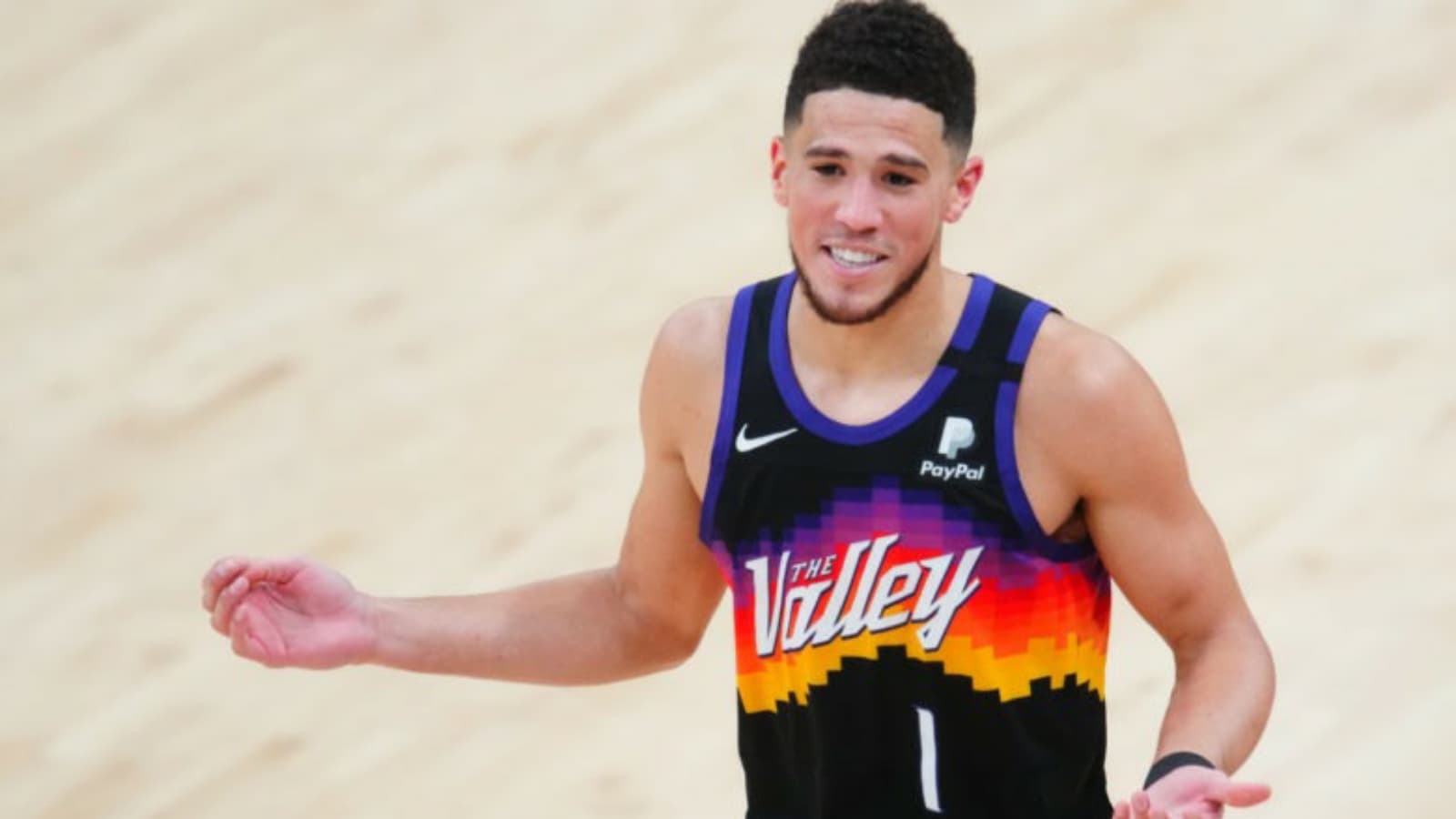 Watch: Devin Booker Hangs in the Air with Poster Dunk; Flexes on Clippers Afterwards