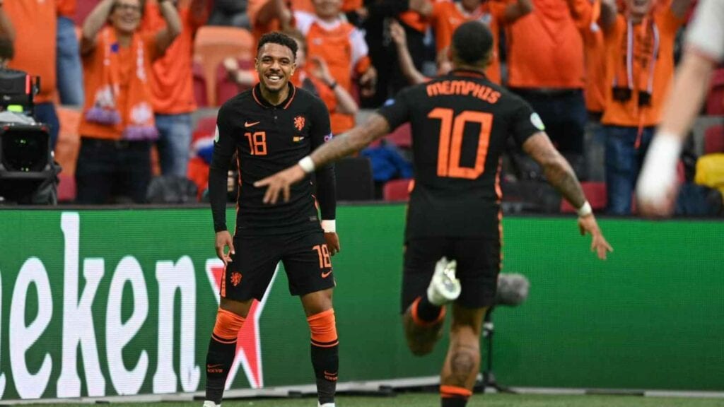 Depay celebrates after scoring his first goal