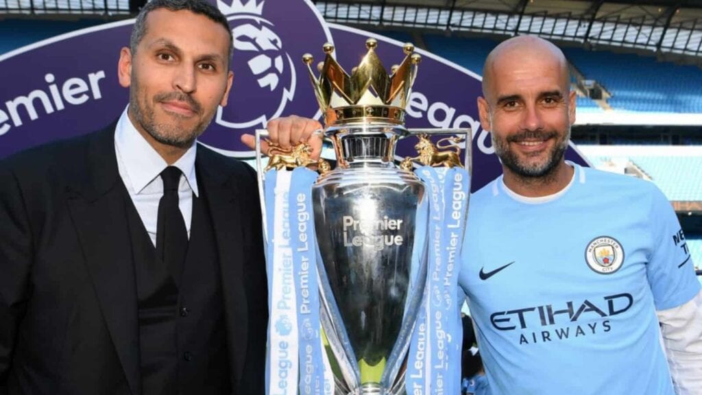 Khaldoon al-Mubarak with Pep Guradiola after winning the Premier League title