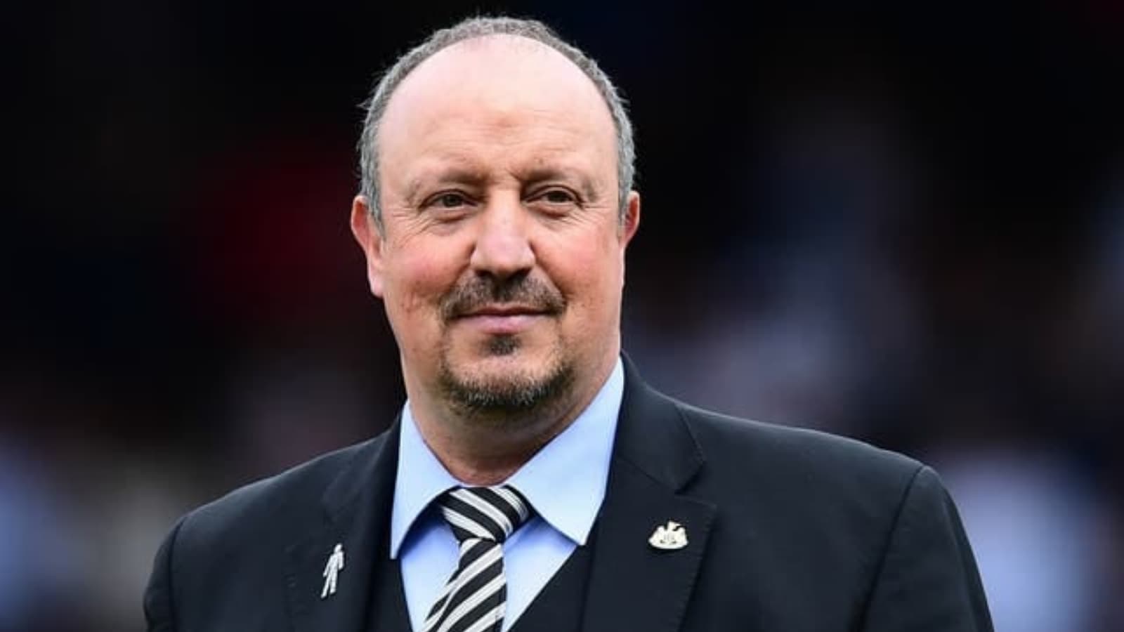 How would Everton FC benefit from Rafael Benitez’s presence?