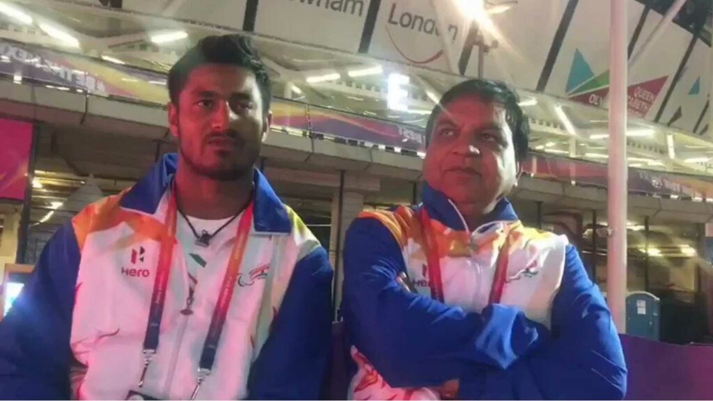 Sundar Singh Gurjar with coach Mahavir Prasad Saini