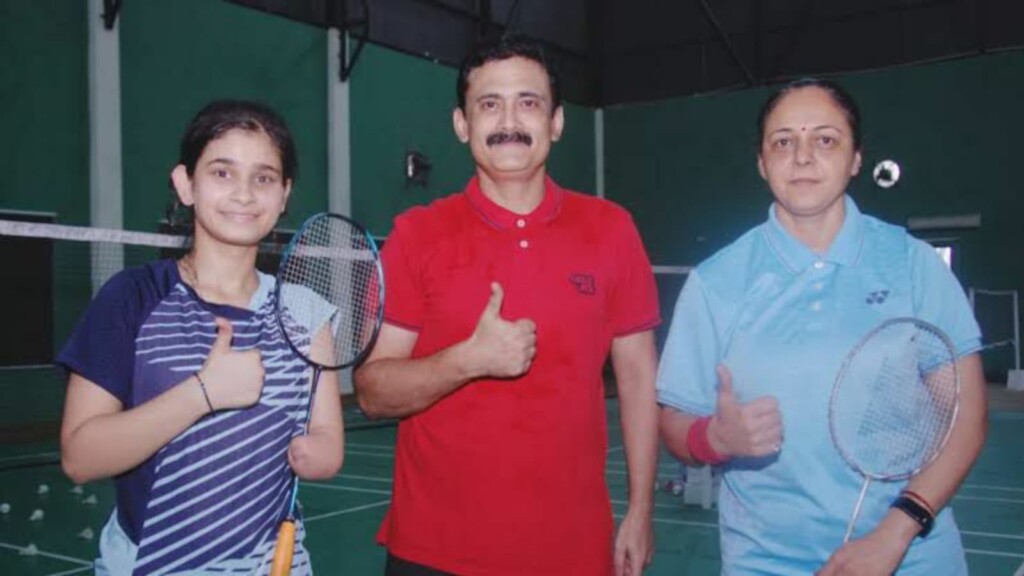 Kolhi with her coach and doubles partner Parul Parmar