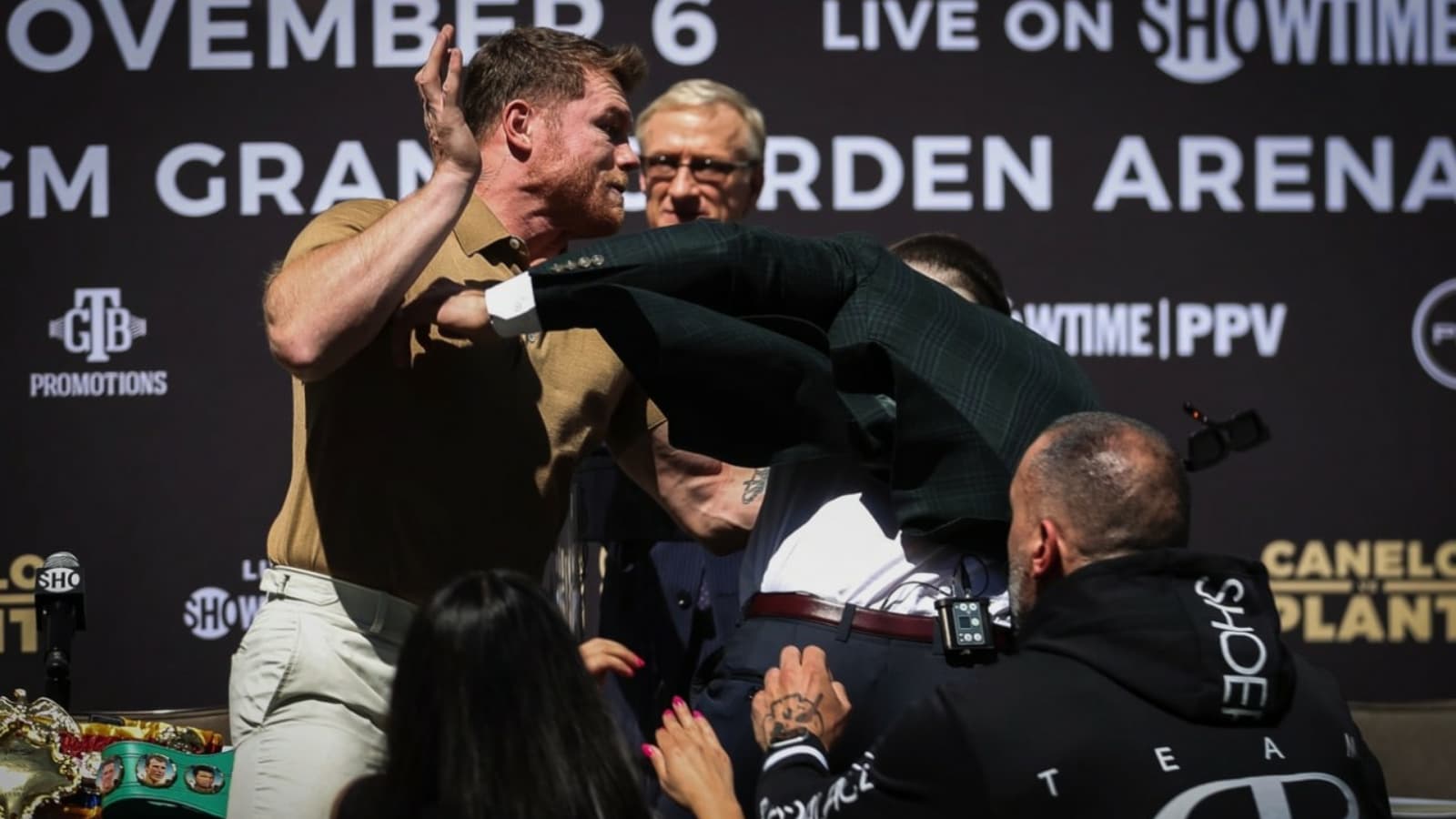 Devin Haney, Errol Spence, Dana White, and others react to the ugly press-conference brawl between Canelo Alvarez and Caleb Plant