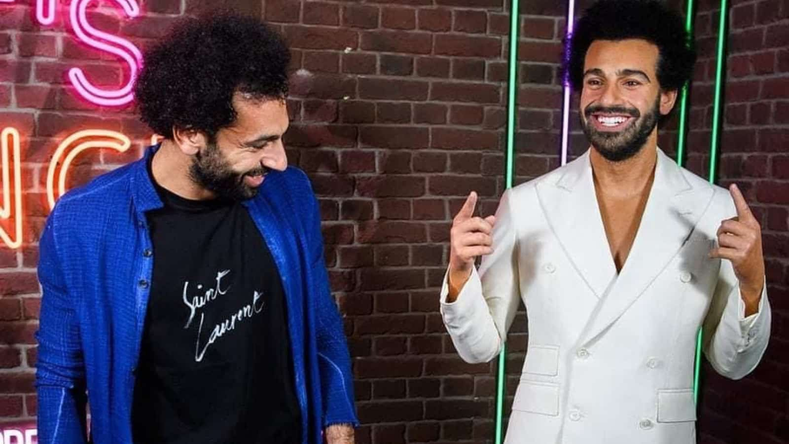 WATCH: Mohamed Salah takes a peek to find abs on his wax figure in Madame Tussauds