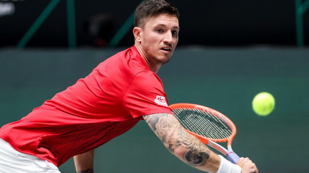 Dennis Novak in action at the Davis Cup Finals 2021