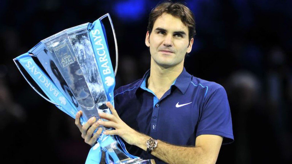 Roger Federer with the 2011 ATP Finals Trophy