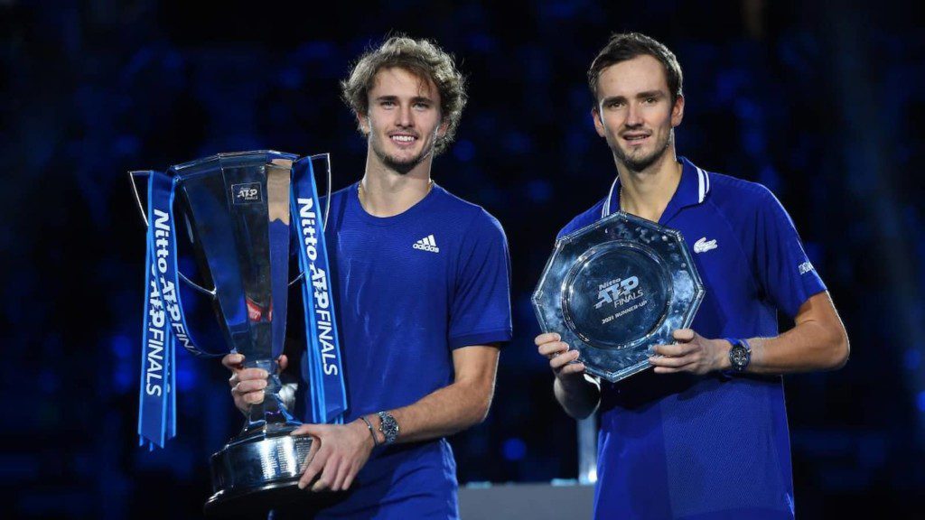 Alexander Zverev and Daniil Medvedev with their respective 2021 ATP Finals trophies