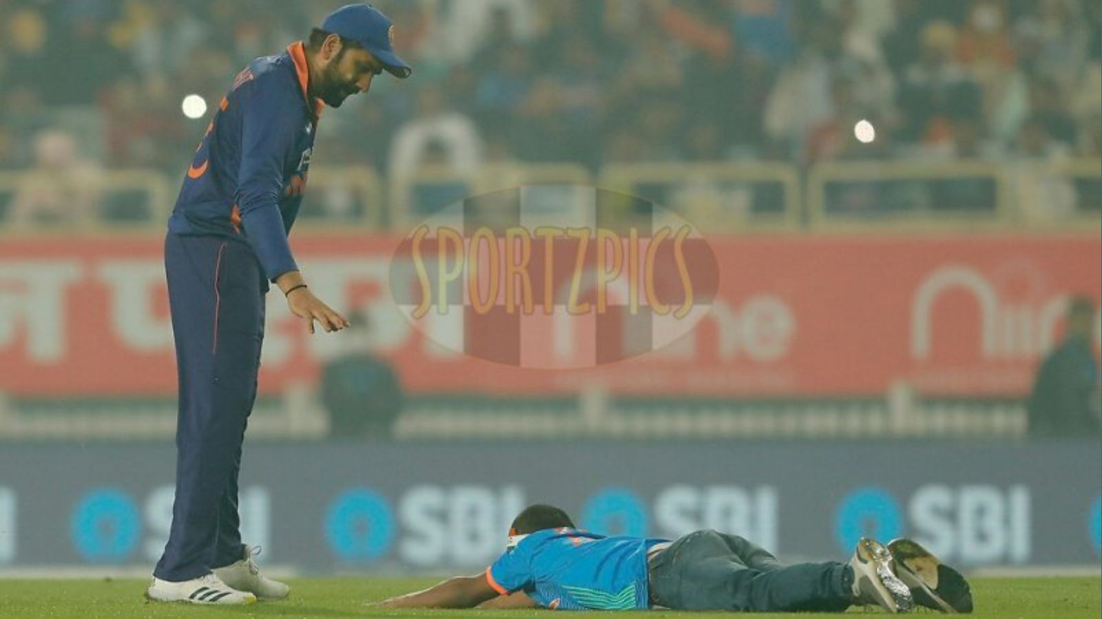 WATCH – Rohit Sharma’s fan encroaches field during second T20I, tries to touch his feet