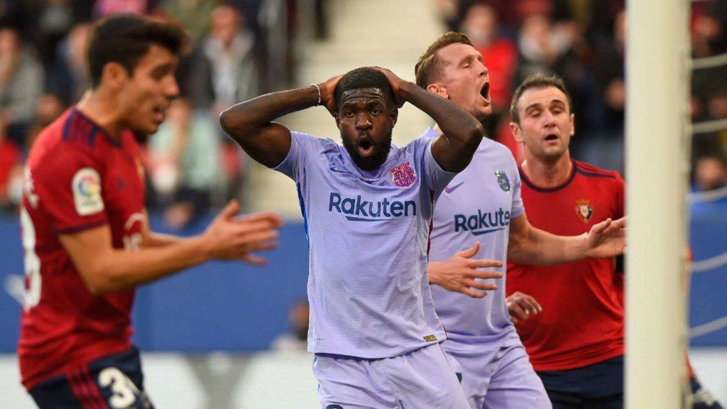 Umtiti and Luuk De Jong react as they concede they goal