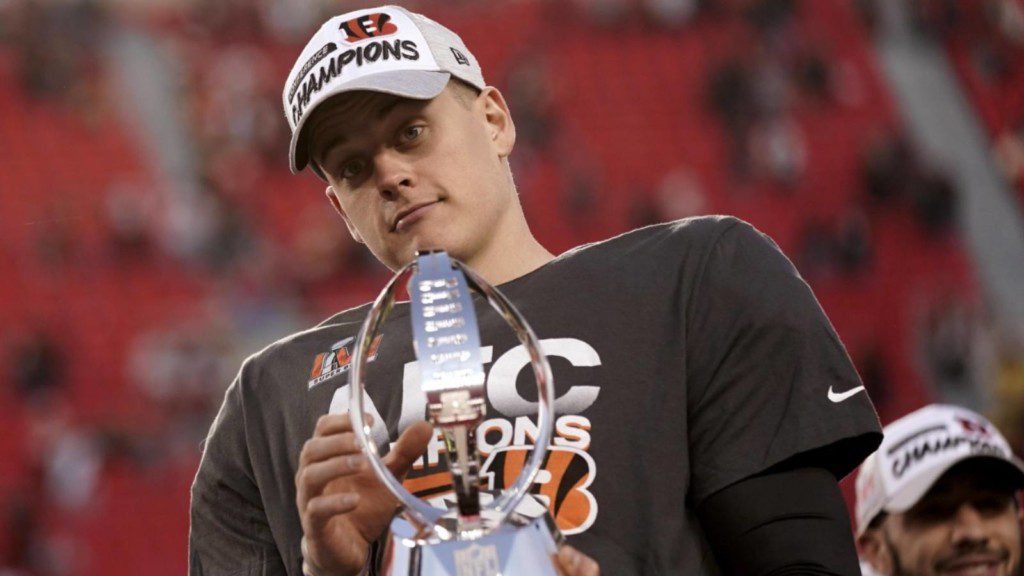 Joe Burrow with the AFC Championship trophy