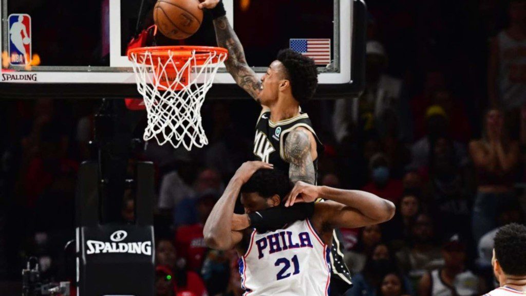 John Collins puts Joel Embiid on a Poster