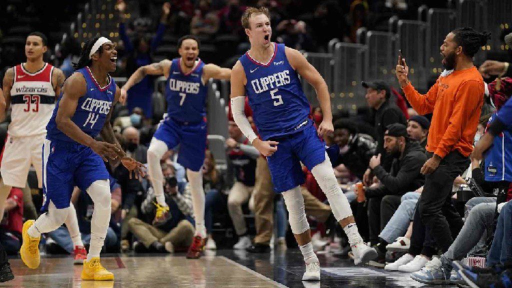 Luke Kennard celebrates after the win against the Washington Wizards