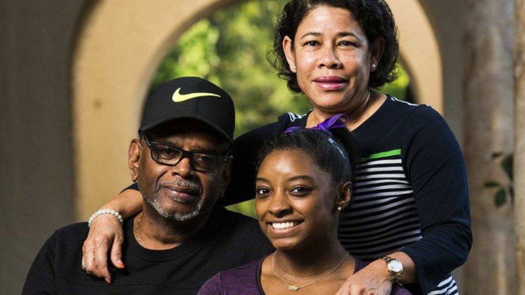 Simone Biles with her parents