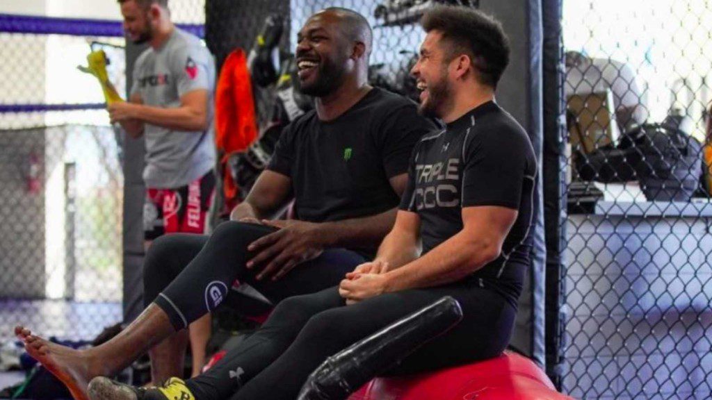 Jon Jones with Henry Cejudo