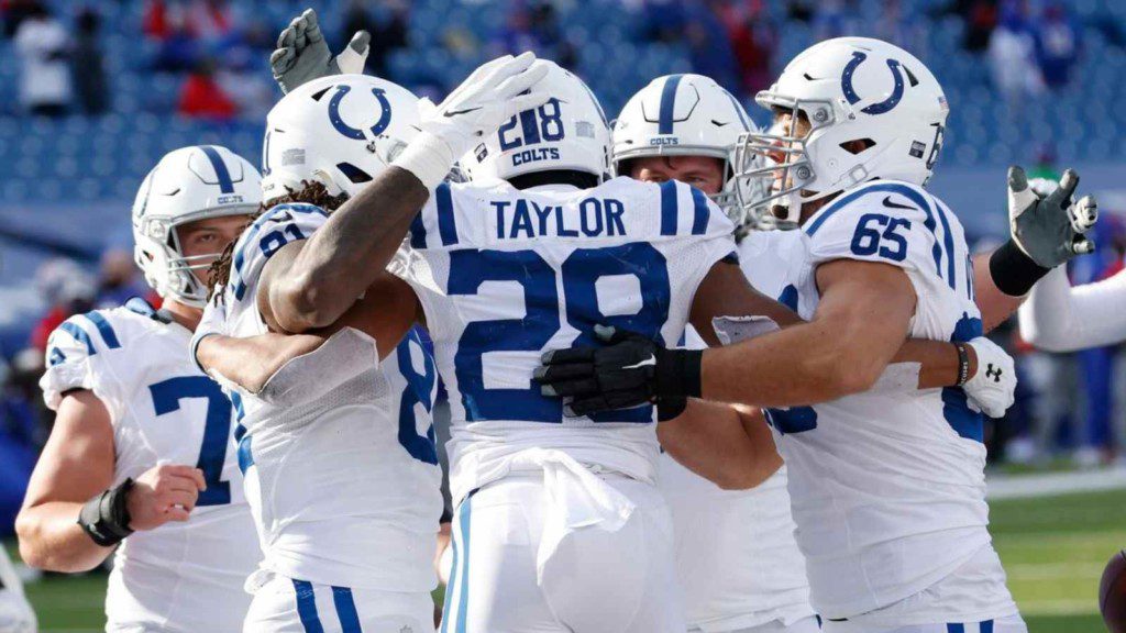 Colts players celebrate a TD