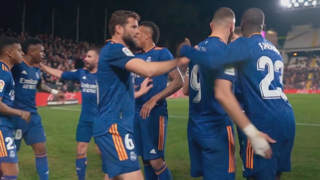 Real Madrid players celebrate late winner