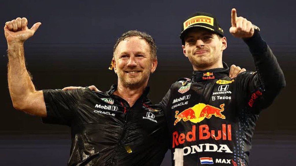 Red Bull Racing's Team Principal Christian Horner and Max Verstappen after the latter's maiden championship win