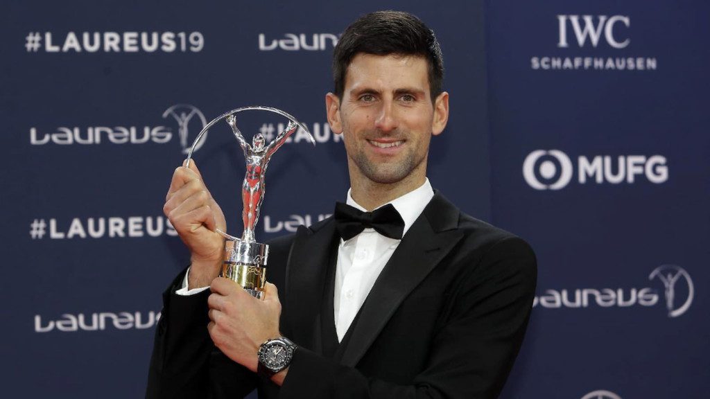 Novak Djokovic with his 2019 Sportsman of the Year trophy won at the Laureus Awards