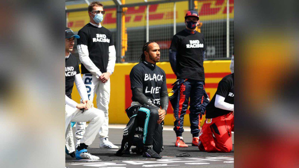 Lewis Hamilton taking a knee against racism