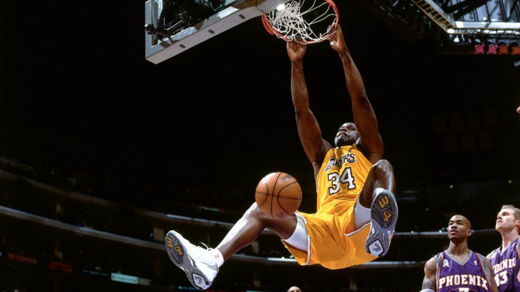 Shaquille O'Neal dunks