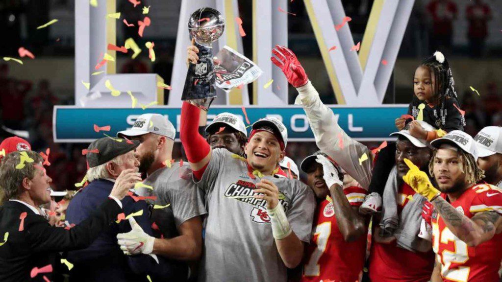 Patrick Mahomes with Super Bowl LIV trophy