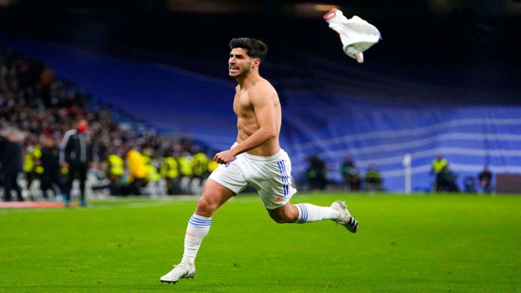 Marco Asensio celebrates after scoring