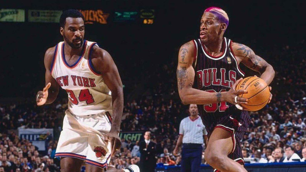 Charles Oakley and Dennis Rodman in action