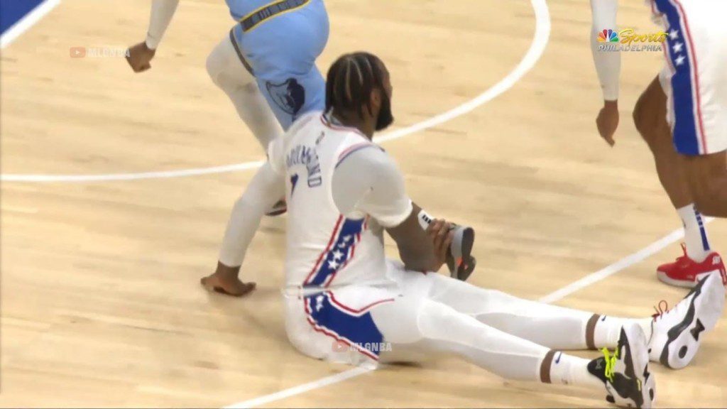 Andre Drummond falls after JA Morant zoom passes him