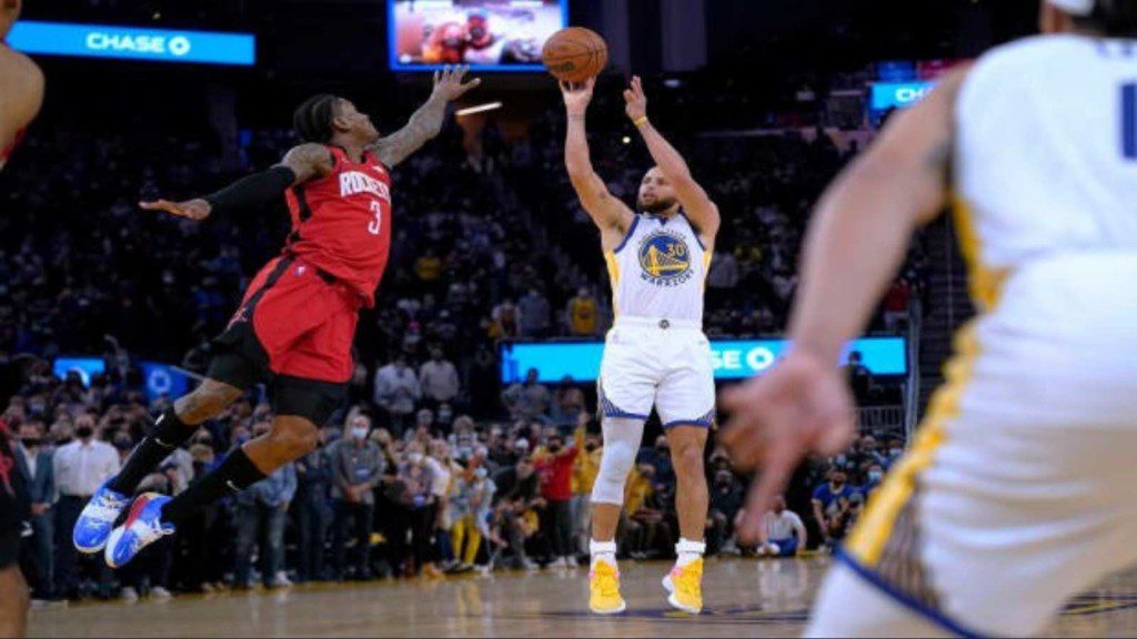 Stephen Curry and Kevin Porter Jr.