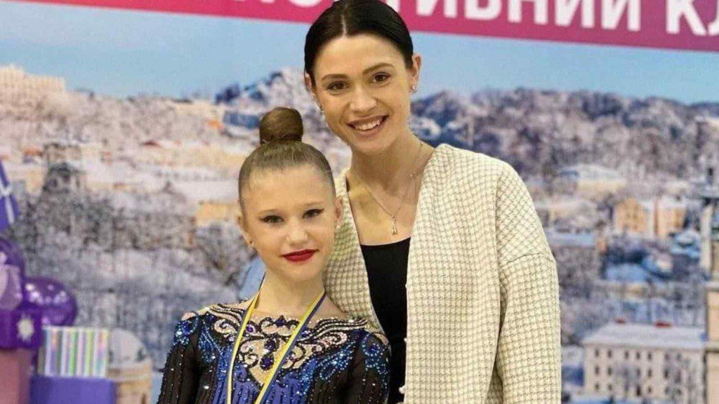 Kateryna Diachenko and her coach