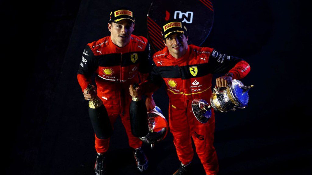 Carlos Sainz with teammate Charles Leclerc(on his left)