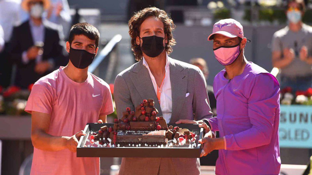 Carlos Alcaraz, Feliciano Lopez, Rafael Nadal celebrating Alcaraz's birthday at the 2021 Madrid Masters