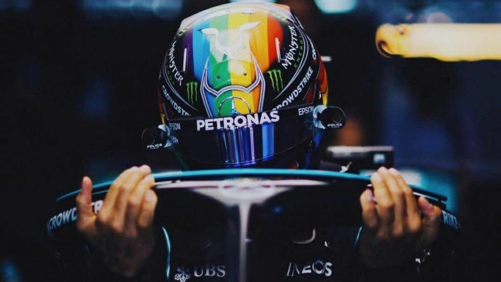 Lewis Hamilton wears a rainbow helmet to support the LGBTQ+ community