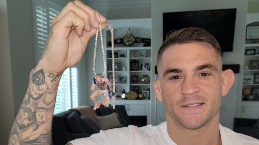 Jake Paul give Dustin Poirier the sleepy mac chain