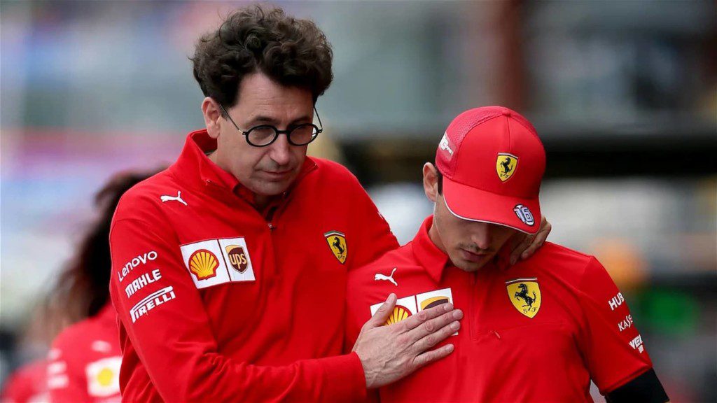 Mattia Binotto with Charles Leclerc