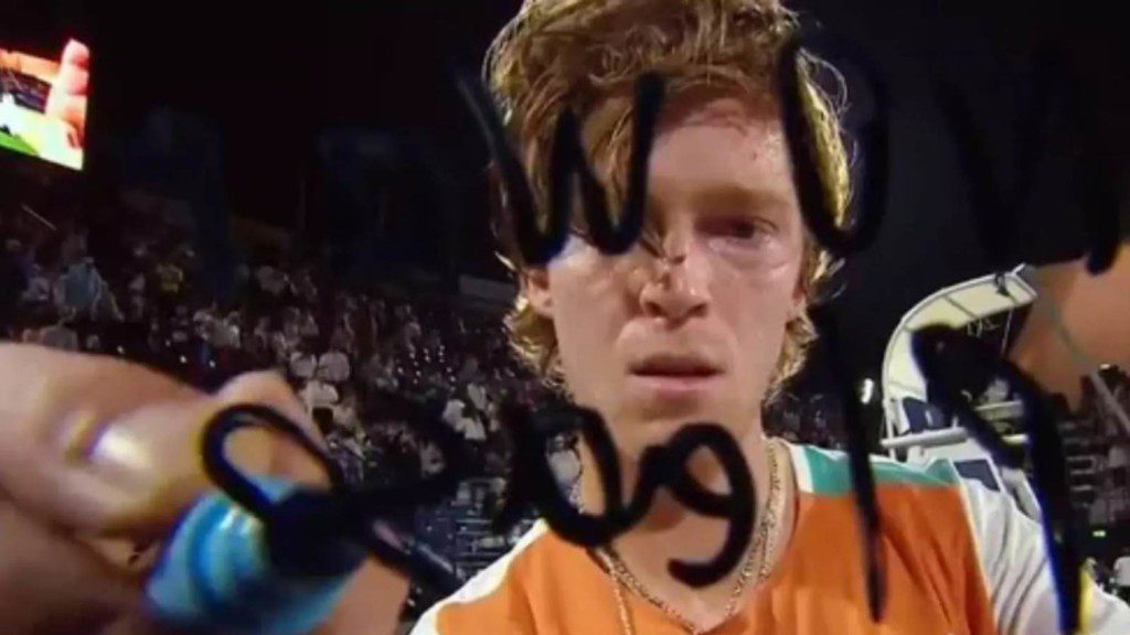 Andrey Rublev writing 'No war please' on camera