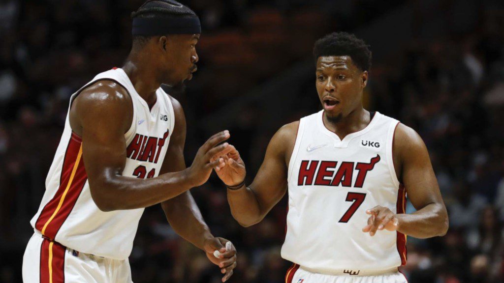 Jimmy Butler and Kyle Lowry in action