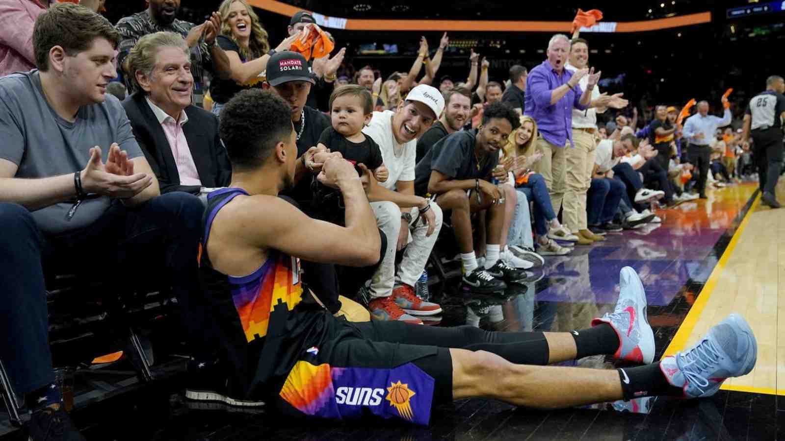 “Kendall Jenner is a lucky girl” NBA Fans fall in love with Devin Booker as he fist-bumped a baby after a tough jumper vs Pelicans