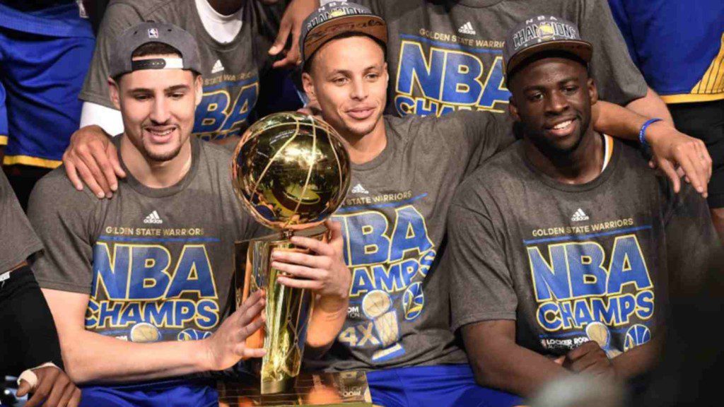 Stephen Curry. Klay Thompson, Draymond Green with the Trophy